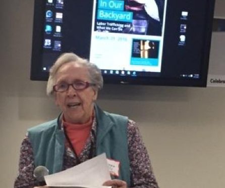 Sr. Joyce Cox, BVM, founding member of the Multifaith Coalition, speaking at the gathering on March 31st.