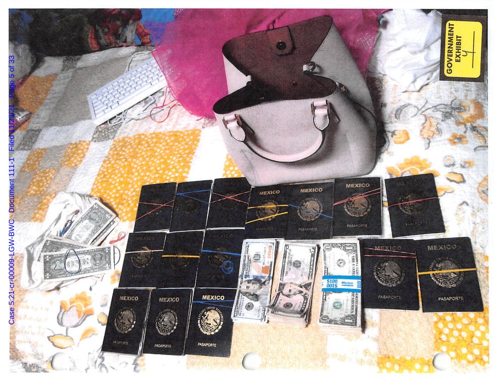 Photo showing Mexican passports and money included as an exhibit in a criminal case stemming from the Blooming Onion investigation.