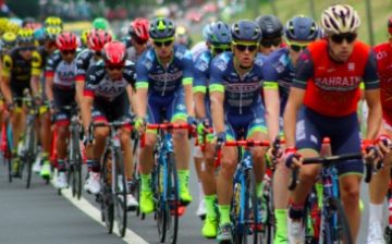 Tour de France: cyclists may be riding on the backs of migrants in debt bondage