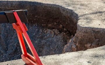 Migrant workers save driver from sinkhole in Singapore—but is anyone protecting them?