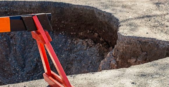 Migrant workers in Singapore saved a driver from sinkhole but is anyone protecting them?