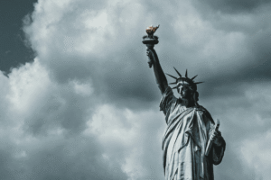statue of liberty against a cloudy sky